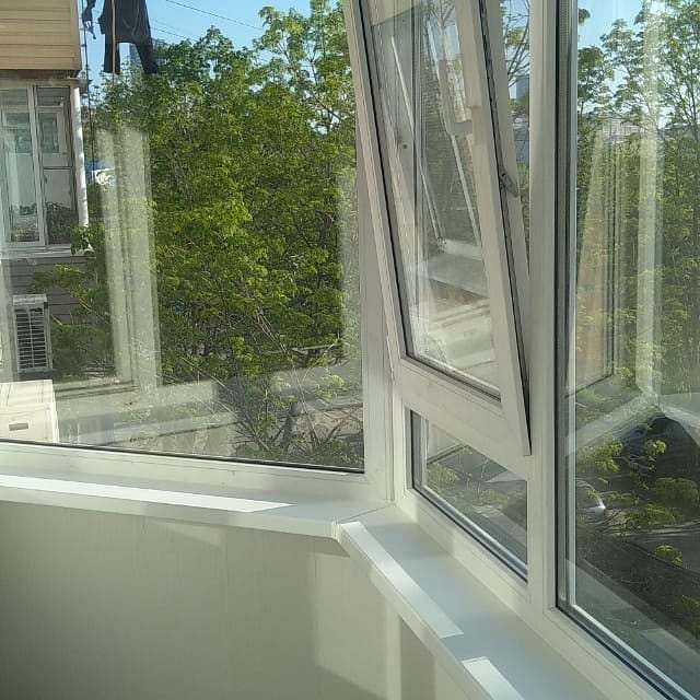 Окна KBE Expert на угловом балконе - фото 3